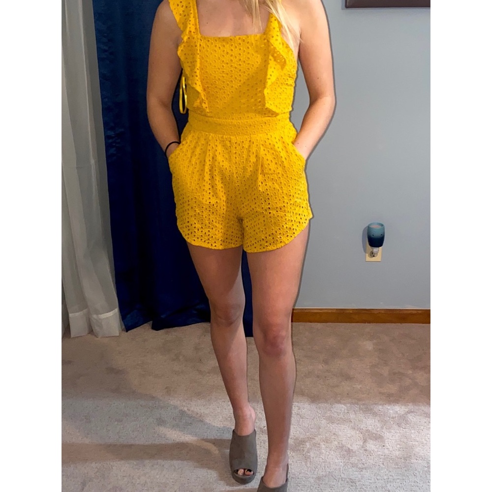 Yellow lace romper with open back